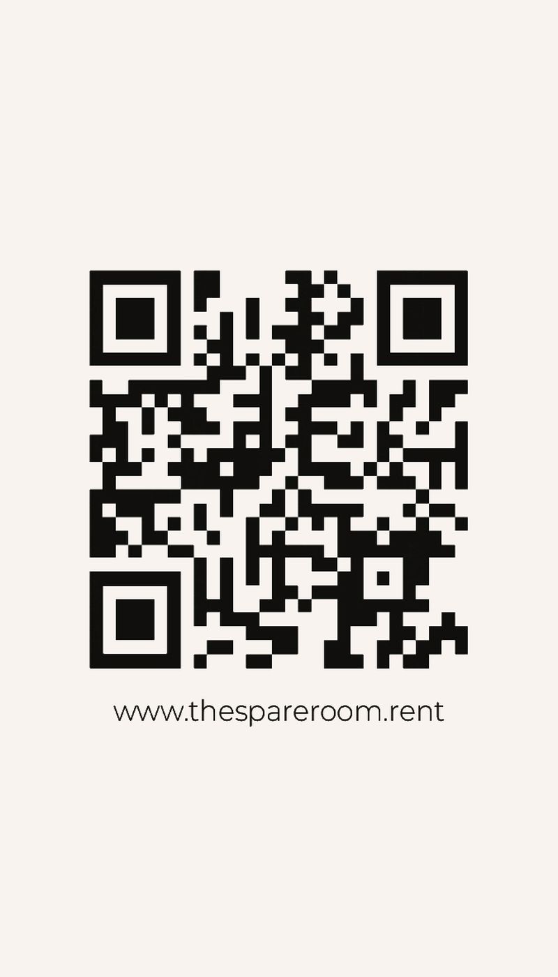 Card back with a QR code and the website address on off-white