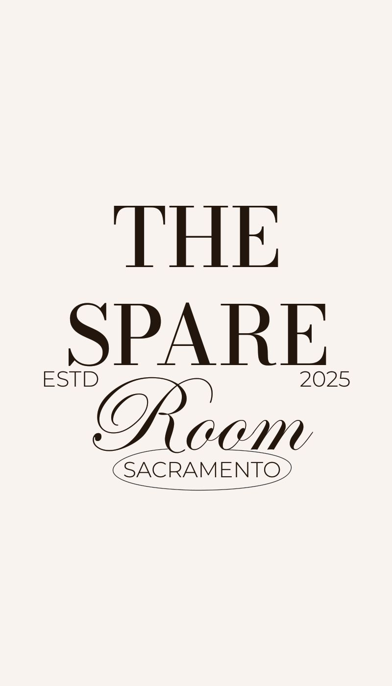 The Spare Room card front with a large dark wordmark on off-white